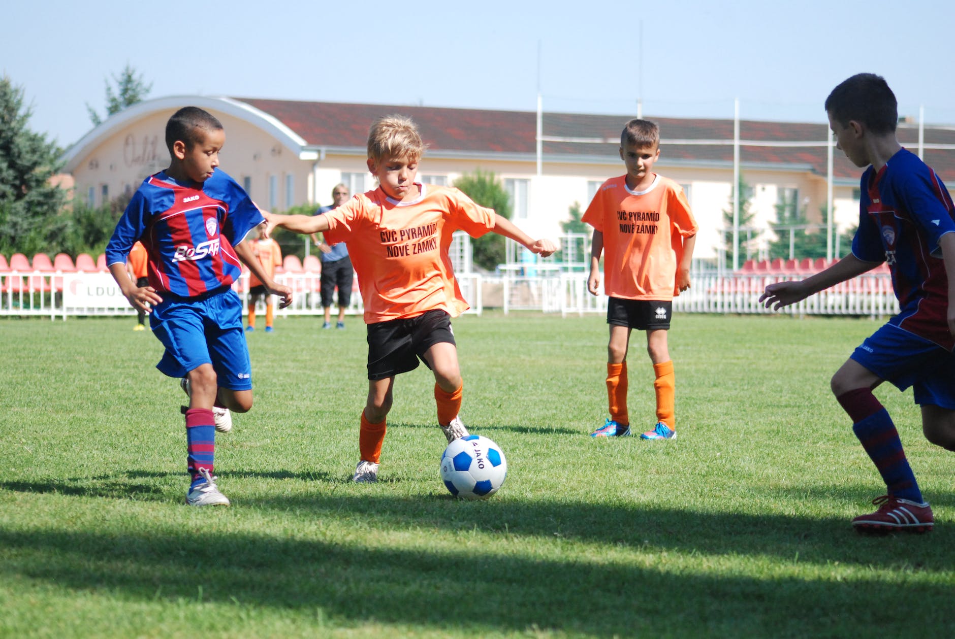 a boy kicking a ball